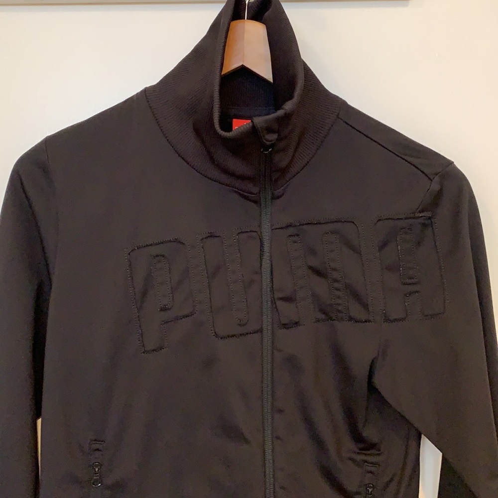 Puma jacket. Normal wear and tear